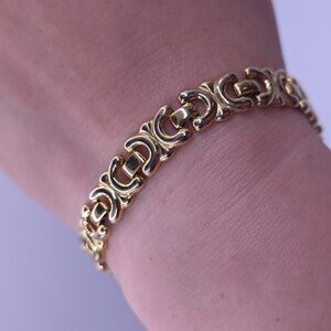 Elegant "C" Style Link Goldtone Bracelet